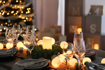 Table served for Christmas dinner in living room