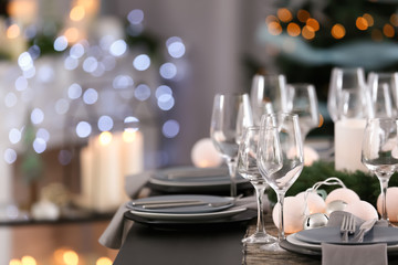 Table served for Christmas dinner in living room