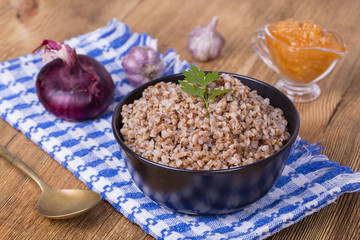 Food background. The boiled buckwheat porridge closeup.
