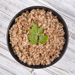 Food background. The boiled buckwheat porridge closeup.