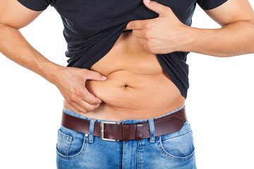 Fototapeta premium Young man's fatty abdomen