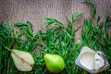 Fototapeta premium Healthy and delicious yogurt with green pear