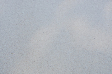 Abstract multicolored smooth sandy beach texture.