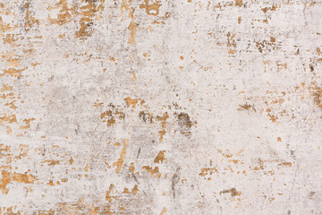 Chipped paint on old wall background - Old cement plastered wall that has chipped paint.
