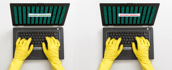 Two computer criminals hacking laptops top view