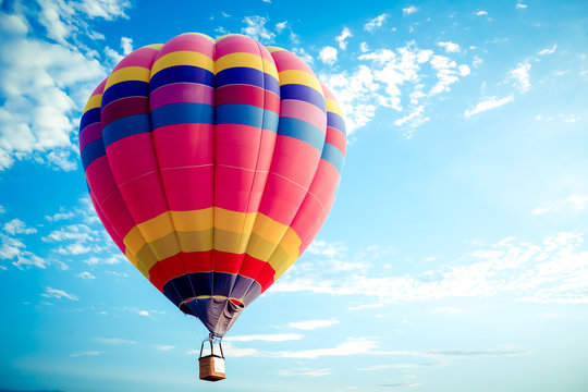 Colorful hot air balloon flying on sky. travel and air transportation concept - balloon carnival in Thailand