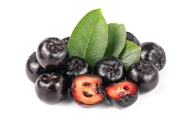 Chokeberry with leaf isolated on white background. Black aronia berries