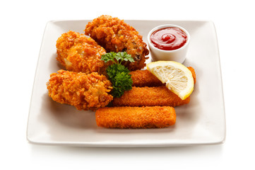 Fried fish fingers with chicken nuggets