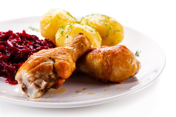Roast drumsticks with potatoes