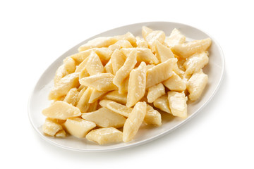 Potato noodles - dumplings on white background