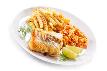 Fish dish - fried fish fillet french fries and vegetables