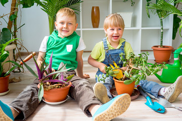 Kids gardening in greenhouse