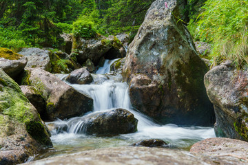 flow of picturesque mountain stream in the gorge
