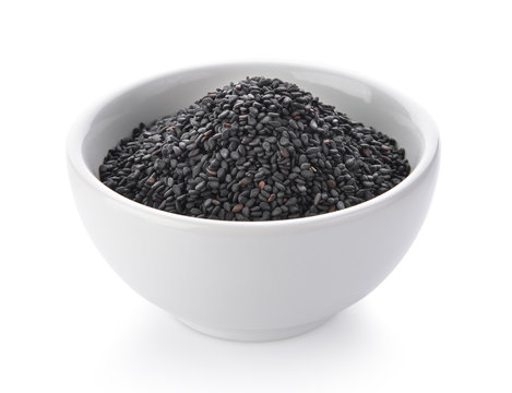 Black sesame in a bowl on white background