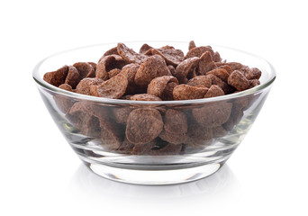 Chocolate corn flakes in a bowl on white background