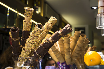 different ice cream cones in the gelateria cafe in italy (nut, chocolate, ordinary)