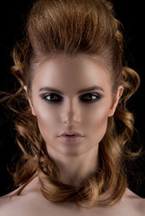 Fototapeta premium Portrait of a fashionable, stylish, beautiful girl, model in the studio. Fashion, style, beauty, portrait, studio.