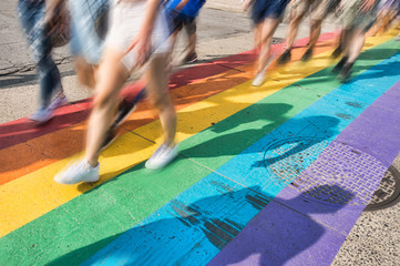 Gay pride flag crosswalk in Montreal gay village - obrazy, fototapety, plakaty