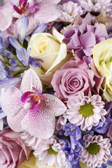 Lovely bouquet of pink orchids, chrysanthemums and hortensias