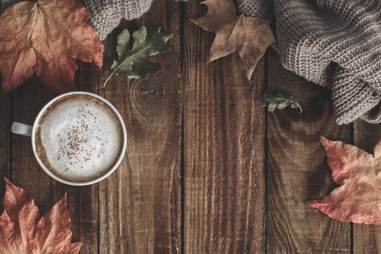 Hot coffee and autumn leaves