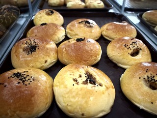 Freshly baked bread and pastries on display at a bakeshop