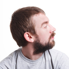 Obraz premium Lost in thoughts, side view of man with pensive thoughtful face