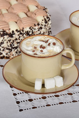 coffee with whipped cream and chocolate and coffee with cream cake