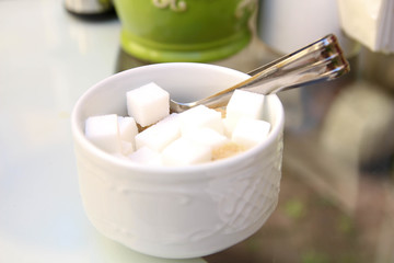 White sugar cube. Unhealthy eating. Restaurant