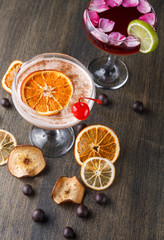Fototapeta na wymiar Colorful cocktails over rustic wood background