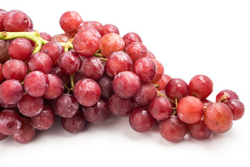 Obraz premium Red grapes on a white background.