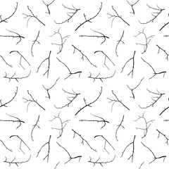 Seamless pattern of black branches on a white background
