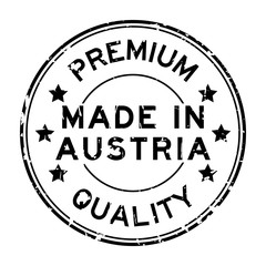 Grunge black premium quality made in Austria round rubber seal stamp on white background