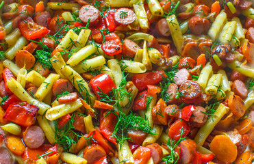 Stewed vegetables and sausages.
