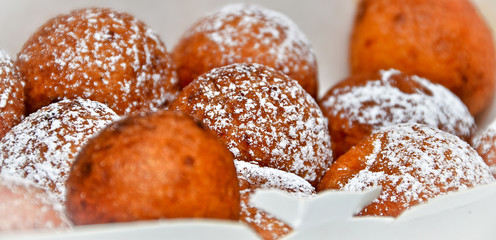 Donuts with powdered sugar. Selective focus