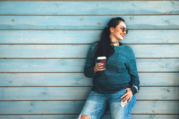 Plus size woman walking on the city street