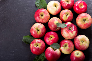 fresh red apples with leaves