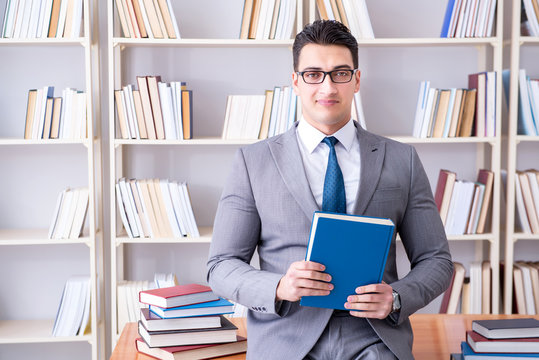 Business Law Student Working Studying In The Library