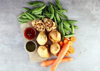 Indian special traditional street food punjabi samosa or Coxinha, Croquete and other Fried Brazilian Snacks