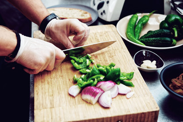 Chef is cutting vegetables, toned