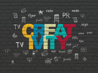 Marketing concept: Creativity on wall background