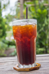 Ice coffee on wood table. Americano. Ice lemon tea.