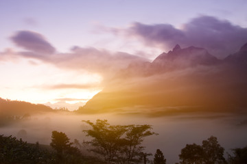 Doi Luang Chiang Dao mountain with sunset and mist at viewpoint in Chiang Mai Province, Thailand