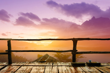 Wooden terrace and balcony high viewpoint with fog and sunrise purple sky