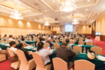 Blur of audience at the seminar meeting room for business.