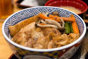Close up teriyaki chicken fried rice and carrot ,mushroom in the bowl