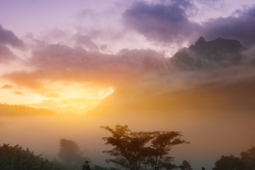 Doi Luang Chiang Dao mountain with sunrise and fog in the morning, Chiang Mai Province, Thailand