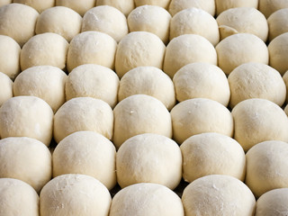 fresh raw dough balls background, trendy seamless pattern from bakery, concept of healthy eating