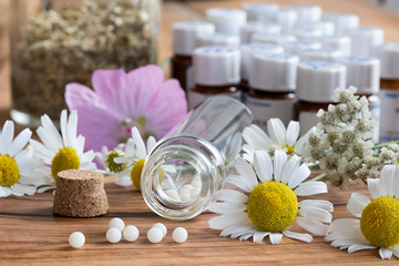 A bottle of homeopathic pills with chamomile and other herbs