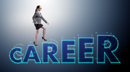 Fototapeta premium Businesswoman climbing career ladder in business concept