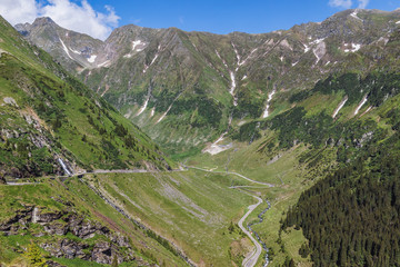Fototapeta na wymiar View of the most famous and dangerous road in Europe is a Transfagarasan road in a high Carpathian mountains, Romania